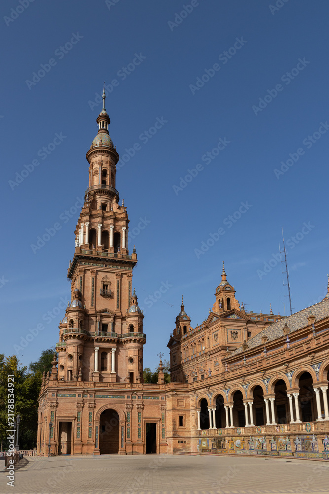 Fototapeta premium Tower and historic pavilion of Plaza de España in Seville, Spain