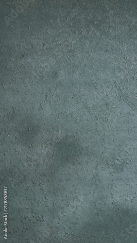 Full-frame vertical texture of a dark grey concrete or plaster wall background.