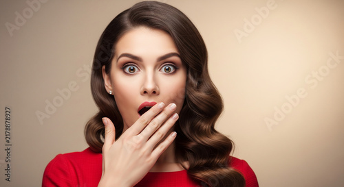 Gorgeous shocked attractive woman gasping and covering mouth reacting fully to fantastic unbelievable shocking new information perfectly isolated nicely