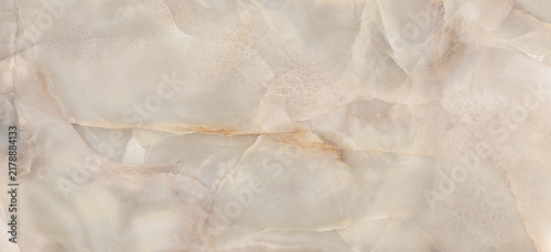 Beige Onyx Alabaster Marble Ceramic Tile Texture Background.