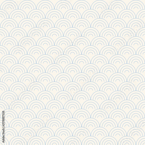 Seamless seigaiha wave pattern in pale sky blue on cream - a traditional Japanese wagara motif of concentric arcs at medium scale