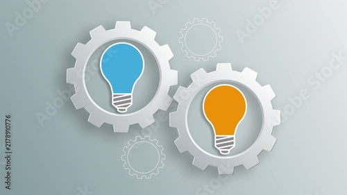 Light bulbs inside interlocking gears representing ideas and innovation