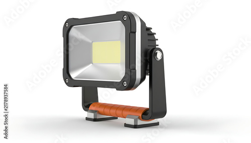 Portable LED work light with an orange handle isolated on a white background.