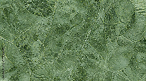 Close up of luxurious emerald green marble stone texture with intricate white veining for upscale interior architecture background