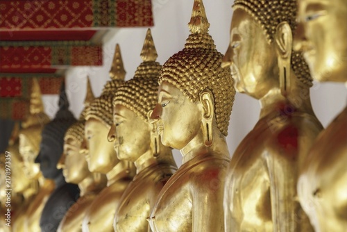 Gilded Buddha statues (Bhumispara-mudra: Gautama Buddha at the moment of enlightenment), Wat Suthat Thepwararam, Royal Temple, Phra Nakhon, Bangkok, Thailand