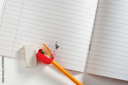 Open Lined Notebook with Pencil