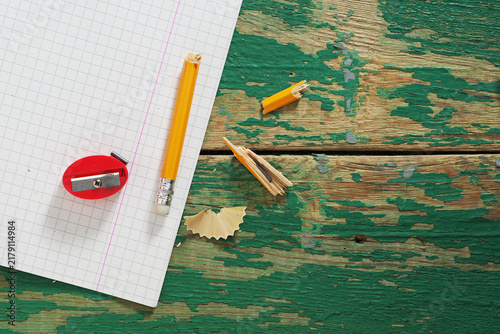 Broken Pencil on Grid Notebook
