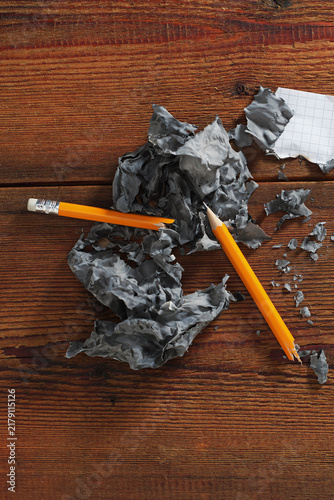 Burning paper and broken pencils