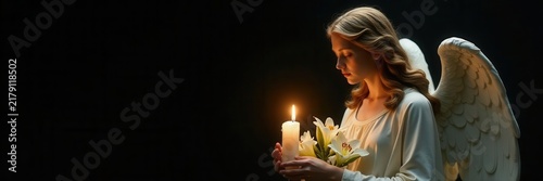 Serene angel with lilies & candle, black background, tribute, delicate