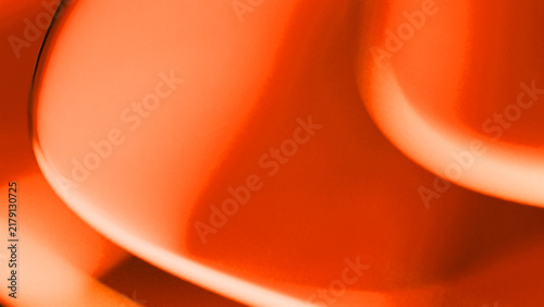 3D Abstract Vibrant Orange Flowing Waves Background with Smooth Glossy Curves and Warm Gradient for Creative Tech Presentation, Web Banner, Cover, and Desktop Wallpaper