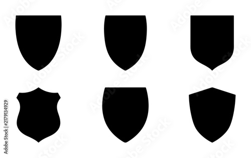 Set of Six Black Shield Icons, Heraldic Emblems, Security Badges, Protective Crests, Vector Graphics for Design Projects