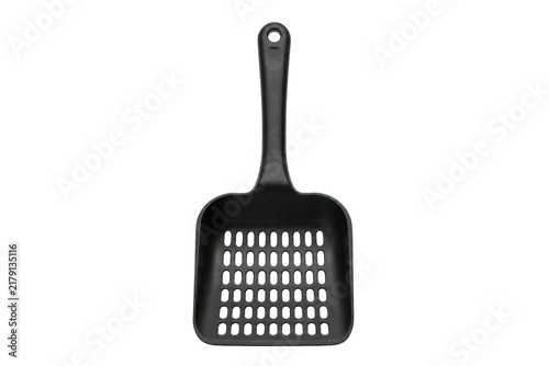 Принти на полотні Single black plastic litter scoop with a long handle and slotted sifter is cente