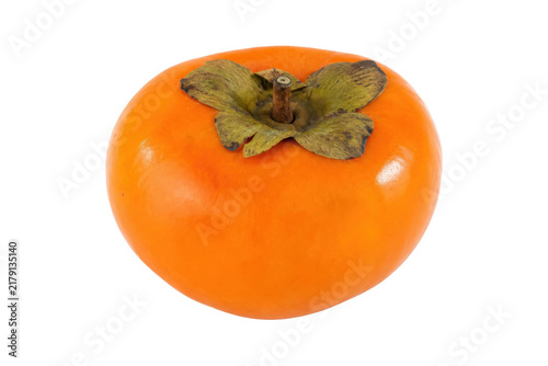 Fotografie Single ripe orange persimmon fruit with green sepals and stem is isolated on a c
