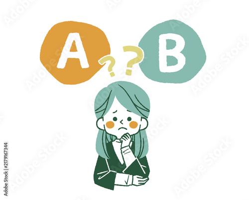 AとBの選択肢を比較をしている困った表情の女性