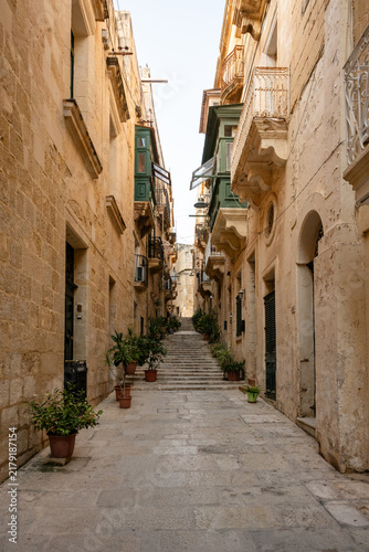 Narrow stepped street in historic Valletta Malta