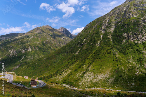 Winding Road Through a Green Alpine Mountain Valley
