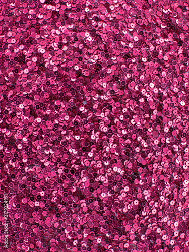 Bright pink sequin fabric texture background