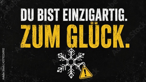German motivational quote with warning sign on black background