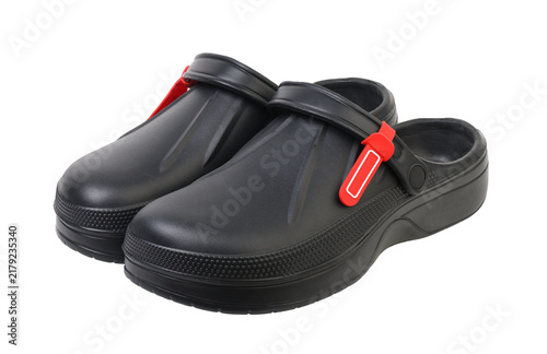  Black rubber clogs work shoes isolated on white background.