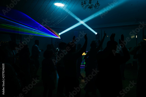 Unrecognizable people dancing in a nightclub