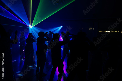 Unrecognizable people dancing in a nightclub