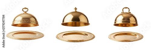 Photography Gold plated food dome cloches and matching service plates luxury restaurant tabl