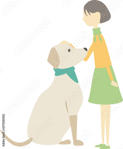 犬の頭を撫でている女の子