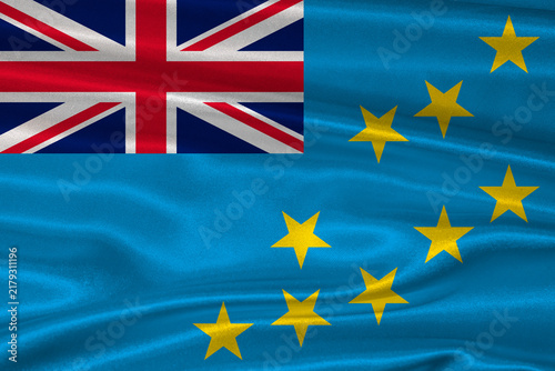 Tuvalu flag textured with fabric background. Flag of Tuvalu with a soft fabric texture