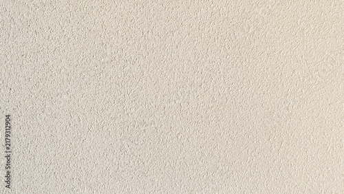 фотографія Off white fine stippled plaster wall rendering texture background with smooth gr