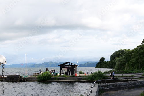 Swan-shaped pedal boat on a lake in Japan