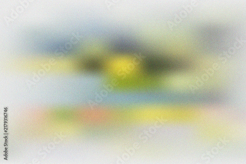 Soft abstract composition with grainy texture featuring diffused horizontal bands of yellow blue and muted pink colors