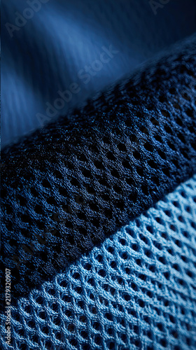Layered blue fabric textures with mesh and smooth surfaces