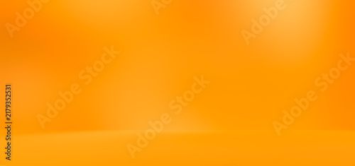 Empty orange yellow golden room studio with shadow of leaves for product presentation. Autumn background. Summer tropical backdrop. Cosmetic showroom.