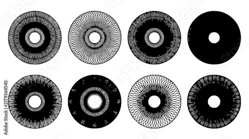 Circular patterns set with concentric circles featuring radial lines, geometric design, monochrome, texture and detail