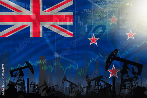 Oil pumps with the New Zealand flag in the background. Oil business concept in New Zealand