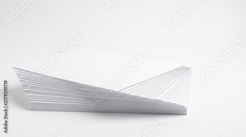 Neat stack of blank paper documents isolated on white