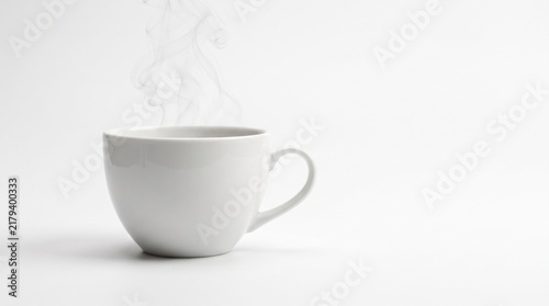 White ceramic coffee cup with rising steam isolated on white