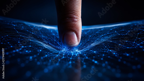 Close-up finger interacting with a glowing blue digital network, symbolizing technology, connectivity, artificial intelligence, innovation, and data interaction.