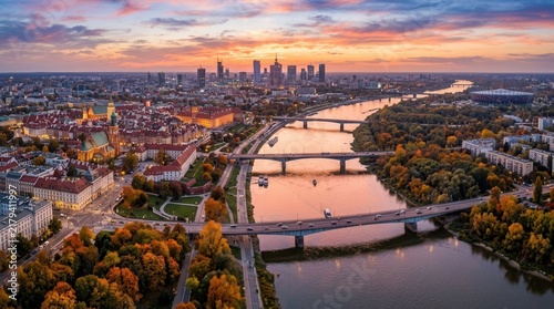 Foto Aerial panoramic view of Warsaw, Poland at sunset, with the Vistula River and autumn foliage
