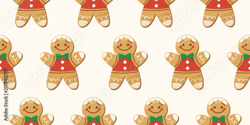 Seamless pattern with cute gingerbread men. Repeating print with sweet glazed pastries for the Christmas holidays. A design perfect for Christmas party invitations and seasonal kids' apparel prints.