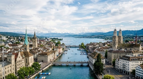 Bild auf Leinwand Aerial panoramic view of Zurich, Switzerland, showcasing the Limmat River, historic Old Town, Grossmünster and Fraumünster churches, and Lake Zurich with distant Alps