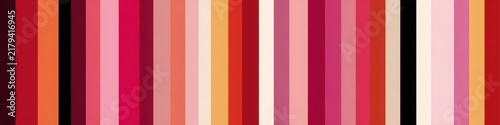 Colorful vertical striped pattern featuring alternating pink, magenta, orange, peach, and light cream stripes in a seamless retro textile design for wallpaper or fabric use