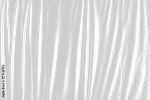 Draped plastic curtain overlay with transparent background for elegant vertical design