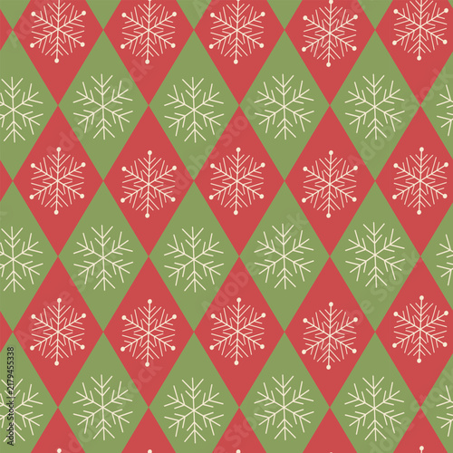 Christmas snowflakes on red and green harlequin diamonds seamless pattern. For Christmas backgrounds, banners, decorations