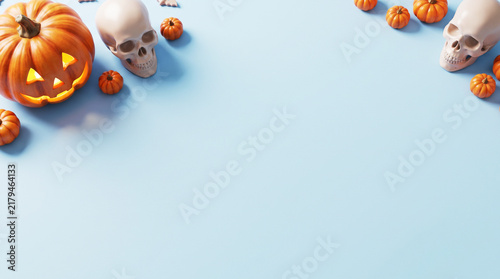 Spooky Halloween Flat Lay Border With Carved Pumpkins And Human Skulls On Blue Background