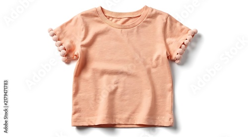 Peach colored childrens tshirt with pom pom sleeves.
