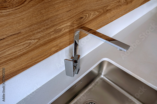 фотографія Chrome kitchen faucet
