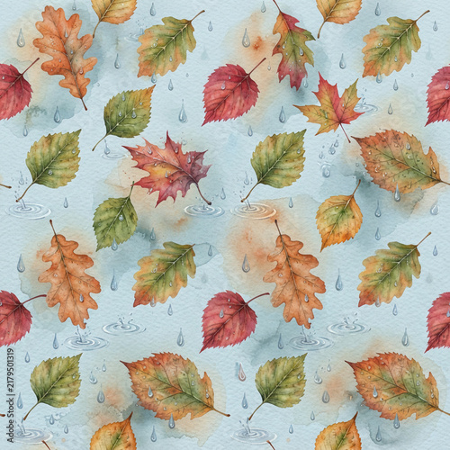 Autumn leaves and ripples on a light blue textured watercolour paper sheet