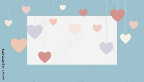 Blank white greeting card template decorated with hanging colorful pastel hearts on a light blue background.