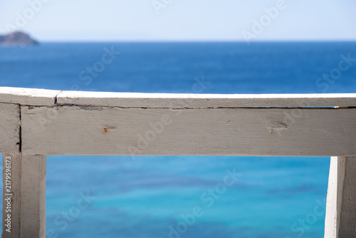 Photography Weathered white railing above turquoise sea at Vroulidia, Chios Island, Greece,